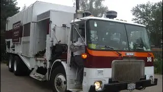 WhiteGMC with Cummins L10 Manual Side Load Garbage Truck + Volvo on Recycling