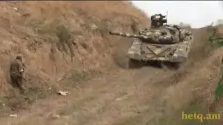 Video near Qaraxanbəyli with Armenian Nagorno-Karabakh soldiers under Azerbaijani artillery fire.