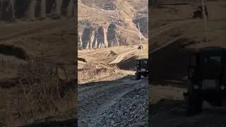 Т-40 с прицепом песка на подъёме