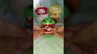 Crocodile eating chocolate 