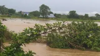 Natural water channel flow obstruction - Flood, unsafe for buildings