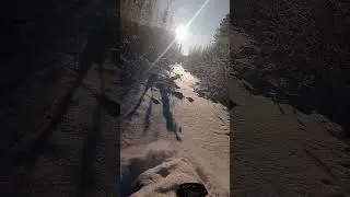 Снегоход Буран (удлиненный) на гусеницах полярник по глубокому снегу.
