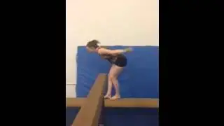 Standing tuck on low beam ~ Emily Hallett