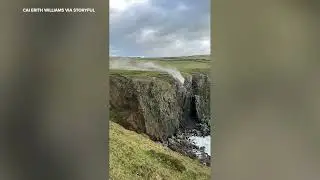 Strong Storm Debi wind creates reverse waterfall