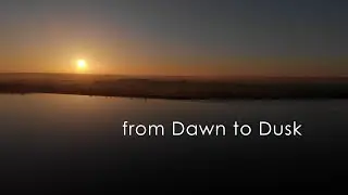 From Dawn to Dusk a Drone's Aerial View. Sunrise to Sunset, Spring, Summer, Autumn, Winter.