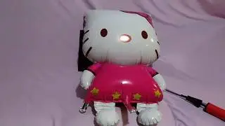 STRUGGLE TO INFLATE BIG HELLO KITTY FOIL BALLOON
