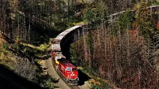 MASSIVE BUSY FREIGHT TRAINS WORKING THRU THE THOMPSON CANYON - CANADA