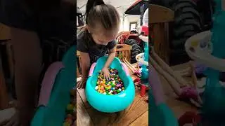 CUTE 3 YEAR OLD GIRL PLAYING BARBIE & ELSA IN A BATH TUB WITH GUMBALL AND SKITTLES CANDY 
