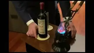 How to open a 1961 Château Péteus wine ($10000-$15000) with heating tools to keep the cork intact.