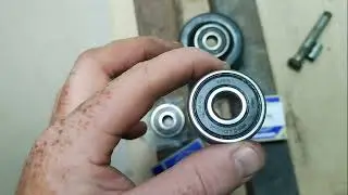 Замена подшипников в натяжном ролике ремня генератора Nissan Tiida.