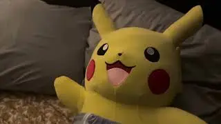 Pikachu watching Pokemon movie while in a soggy diaper goodnites
