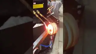 Melting a Railroad spike in seconds! Induction forge! 