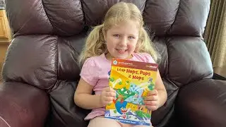 Leah reading “Leap Hops, Pops & Mops”