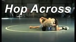 Wrestling Moves KOLAT.COM Using Nut Cracker Grip to Hop Across