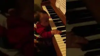 Baby playing piano