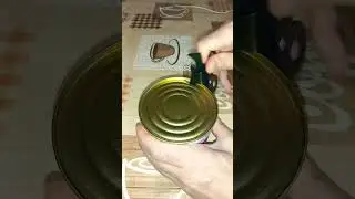 Нож для открытия консервных банок.        Knife for opening cans.