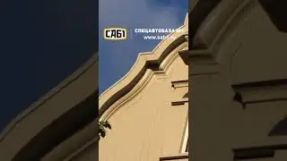 Зачем на домах в Амстердаме крюки?