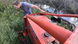 braking a beaver dam with skidder.