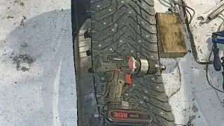 Homemade snowmobile with a Prius engine, making a track from a tire.