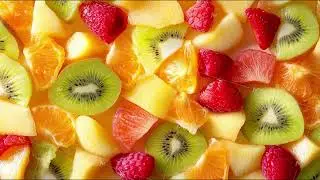 abstract fresh background pieces slices of different fruits top view