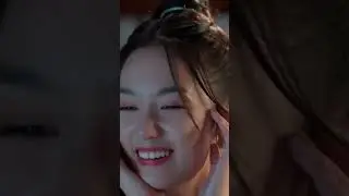 The girl peeks at the man taking shower and giggles! 