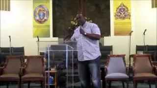 Elder Demario Reid ministers at 