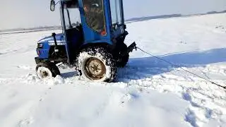 Донг Фенг 240 в снегу на поле