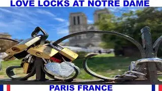 LOVE LOCKS AT NOTRE DAME CATHEDRAL IN PARIS FRANCE