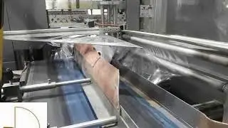 Линия по перемотке и упаковке в пленку рулонных материалов