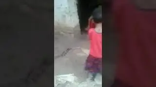 Little girl drinking fruity