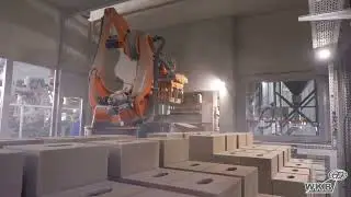 Sand lime brick press with a robot / Presse  zur Herstellung von Kalksandstein