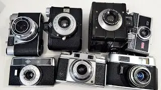 Ящик с пленочными фотоаппаратами