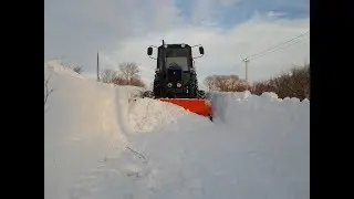 Поворотный  отвал на мТз обзор