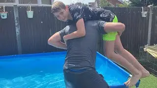 Dad vs son freezing cold swimming pool wrestling match