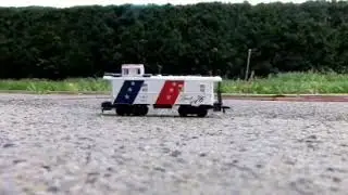 Scott crushes train caboose