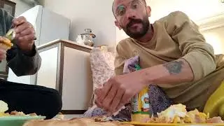 Eggs and sausages and chips and Coca-Cola and sauce 