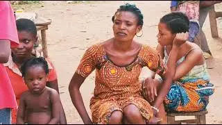 INTERIOR VILLAGE WOMAN PRAYED