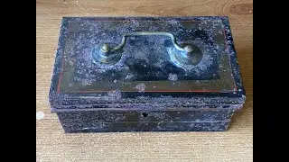WHAT IS IN THIS RUSTY OLD TIN BOX