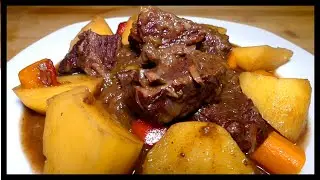 Beef stew with red wine in a pressure cooker.