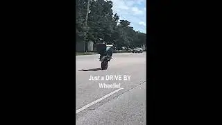 RANDOM Rider waves his bike hello 