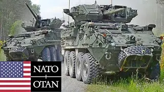 NATO, Germany. Armored vehicles and US soldiers in an integrated tactical network exercise.