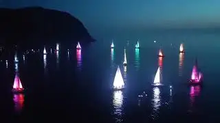 Зрелищный ночной парад яхт в Находке на Рица