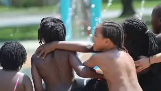 Stock Footage of Children Playing in the water at The Park| Breakroome Stock