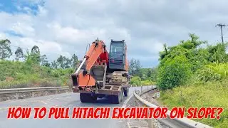 Xe chuyên dụng chở máy đào Hitachi lên dốc hụt hơi, cố gắng cuối cùng cũng vượt qua! Rất thú vị.