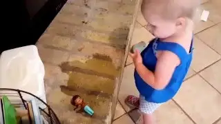 Brooklynn Giving Doc McStuffins a drink