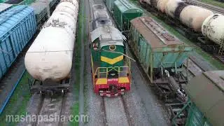 Trains at the railway station. Video for children. Electric trains, freight and passenger trains
