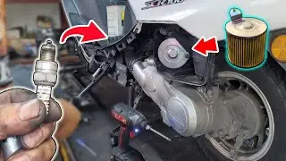 Honda scr100 motorcycle engine spark plug and air filter change