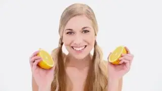 Happy Nude Blonde Smelling Orange - Stock Footage | VideoHive 8358300