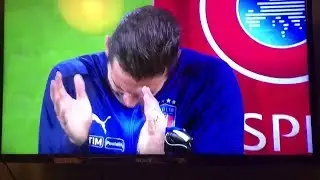 Gianluigi Buffon applauds when Italian fans boo the Swedish national anthem 