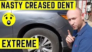 Nasty Creased Dent Repair on Nissan Pathfinder SUV by Ars Dent Repair of Baltimore